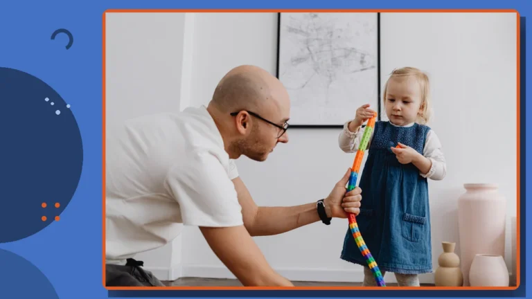 An adult and a young child playing together indoors.