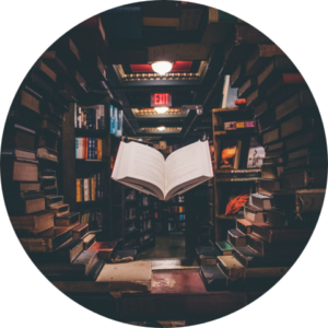 a book floating magically in a library