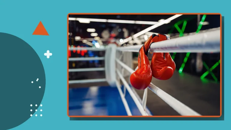 Boxing gloves hanging on the ropes of a ring, illustrating perseverance and the belief that it's not over when it's over.